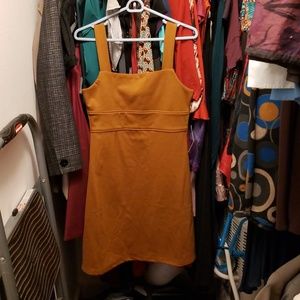 Light brown or gold dress